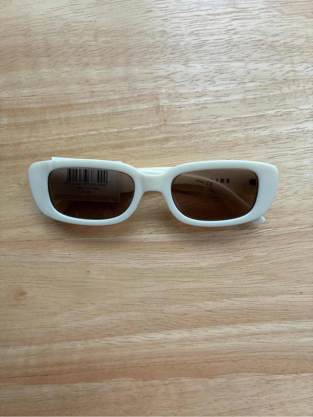 NWT AIRE Ceres Ivory Slim Oval Sunglasses